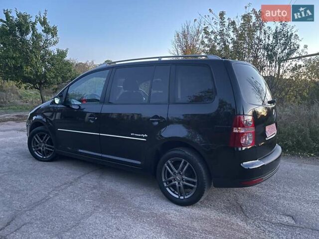Черный Фольксваген Туран, объемом двигателя 1.4 л и пробегом 238 тыс. км за 7888 $, фото 14 на Automoto.ua