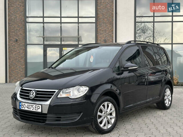 Чорний Фольксваген Туран, об'ємом двигуна 1.97 л та пробігом 336 тис. км за 8200 $, фото 1 на Automoto.ua