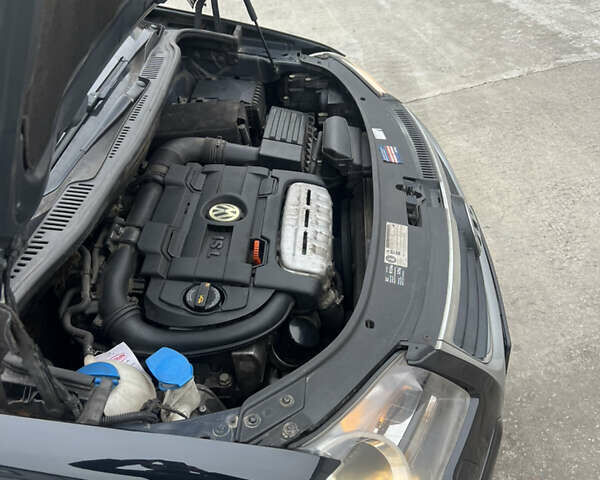 Черный Фольксваген Туран, объемом двигателя 1.4 л и пробегом 213 тыс. км за 8100 $, фото 59 на Automoto.ua