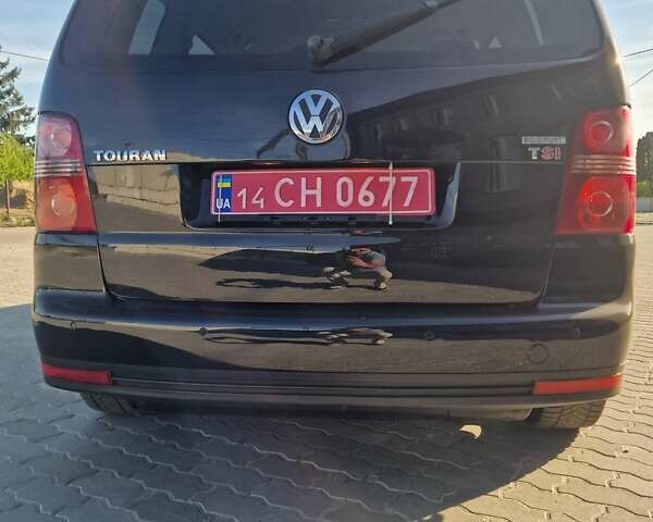 Черный Фольксваген Туран, объемом двигателя 1.4 л и пробегом 197 тыс. км за 8600 $, фото 3 на Automoto.ua