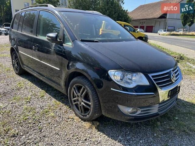 Черный Фольксваген Туран, объемом двигателя 1.4 л и пробегом 238 тыс. км за 7888 $, фото 259 на Automoto.ua
