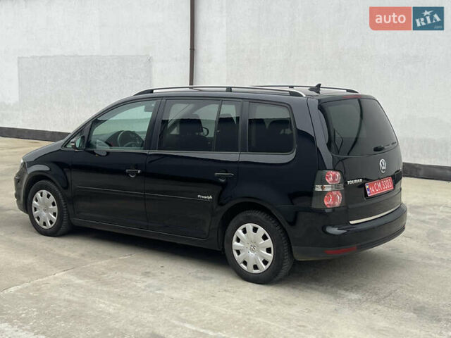 Черный Фольксваген Туран, объемом двигателя 1.4 л и пробегом 213 тыс. км за 8100 $, фото 31 на Automoto.ua