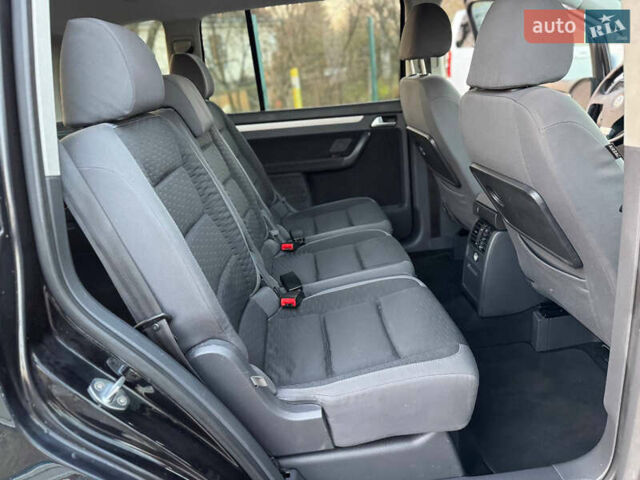 Черный Фольксваген Туран, объемом двигателя 1.6 л и пробегом 215 тыс. км за 7890 $, фото 46 на Automoto.ua