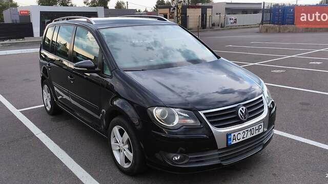 Черный Фольксваген Туран, объемом двигателя 1.39 л и пробегом 195 тыс. км за 8300 $, фото 6 на Automoto.ua