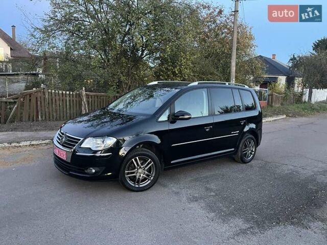 Черный Фольксваген Туран, объемом двигателя 1.4 л и пробегом 238 тыс. км за 7888 $, фото 205 на Automoto.ua