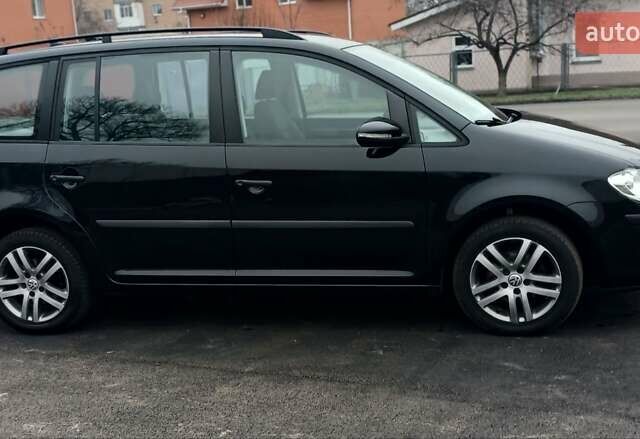Черный Фольксваген Туран, объемом двигателя 1.6 л и пробегом 249 тыс. км за 7999 $, фото 23 на Automoto.ua
