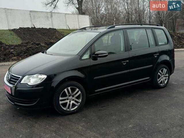 Черный Фольксваген Туран, объемом двигателя 1.6 л и пробегом 249 тыс. км за 7999 $, фото 7 на Automoto.ua