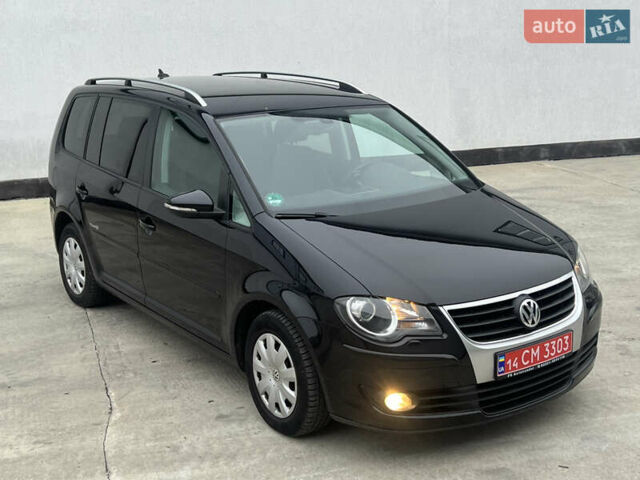 Черный Фольксваген Туран, объемом двигателя 1.4 л и пробегом 213 тыс. км за 8100 $, фото 26 на Automoto.ua