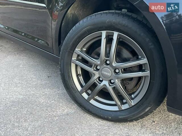 Черный Фольксваген Туран, объемом двигателя 1.4 л и пробегом 238 тыс. км за 7888 $, фото 93 на Automoto.ua