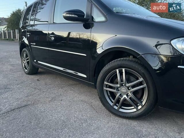 Черный Фольксваген Туран, объемом двигателя 1.4 л и пробегом 238 тыс. км за 7888 $, фото 195 на Automoto.ua