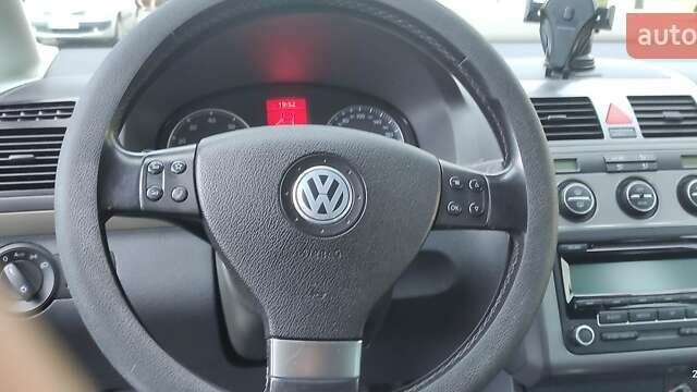Черный Фольксваген Туран, объемом двигателя 1.39 л и пробегом 195 тыс. км за 8300 $, фото 9 на Automoto.ua