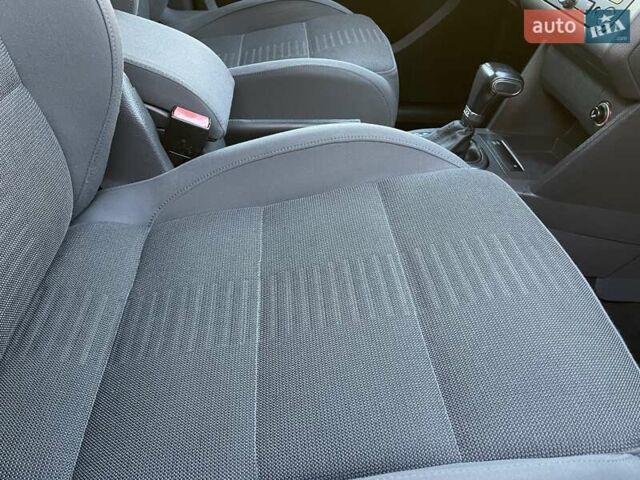 Черный Фольксваген Туран, объемом двигателя 1.4 л и пробегом 238 тыс. км за 7888 $, фото 244 на Automoto.ua