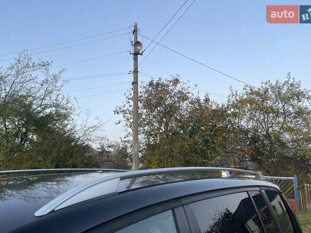 Черный Фольксваген Туран, объемом двигателя 1.4 л и пробегом 238 тыс. км за 7888 $, фото 34 на Automoto.ua