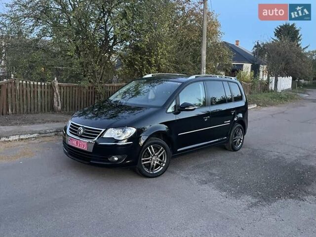 Черный Фольксваген Туран, объемом двигателя 1.4 л и пробегом 238 тыс. км за 7888 $, фото 206 на Automoto.ua