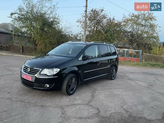 Черный Фольксваген Туран, объемом двигателя 1.4 л и пробегом 238 тыс. км за 7888 $, фото 83 на Automoto.ua