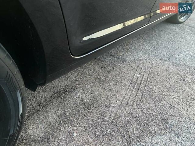 Черный Фольксваген Туран, объемом двигателя 1.4 л и пробегом 238 тыс. км за 7888 $, фото 100 на Automoto.ua