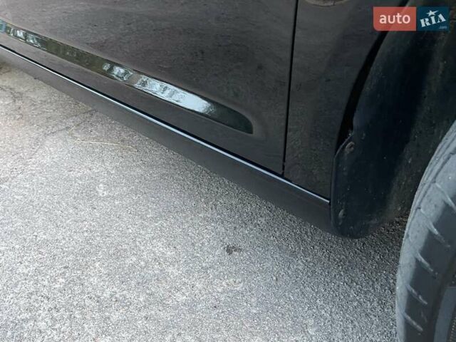 Черный Фольксваген Туран, объемом двигателя 1.4 л и пробегом 238 тыс. км за 7888 $, фото 94 на Automoto.ua