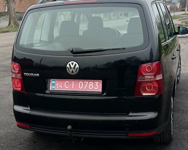 Черный Фольксваген Туран, объемом двигателя 1.6 л и пробегом 249 тыс. км за 7999 $, фото 18 на Automoto.ua