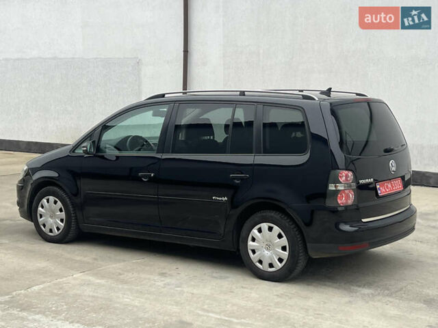 Черный Фольксваген Туран, объемом двигателя 1.4 л и пробегом 213 тыс. км за 8100 $, фото 89 на Automoto.ua