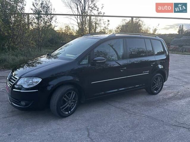 Черный Фольксваген Туран, объемом двигателя 1.4 л и пробегом 238 тыс. км за 7888 $, фото 12 на Automoto.ua