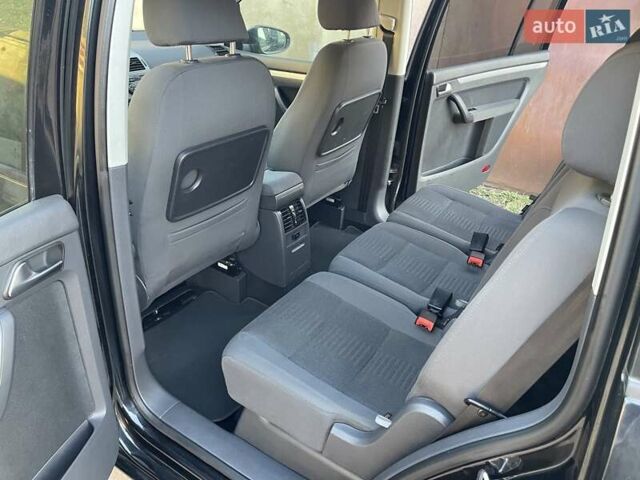 Черный Фольксваген Туран, объемом двигателя 1.4 л и пробегом 238 тыс. км за 7888 $, фото 138 на Automoto.ua