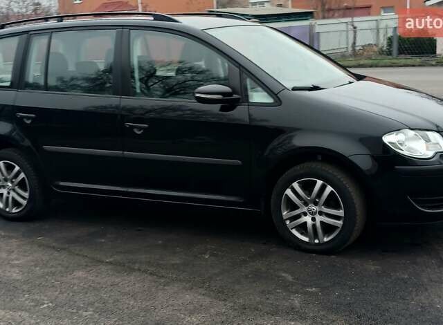 Черный Фольксваген Туран, объемом двигателя 1.6 л и пробегом 249 тыс. км за 7999 $, фото 24 на Automoto.ua