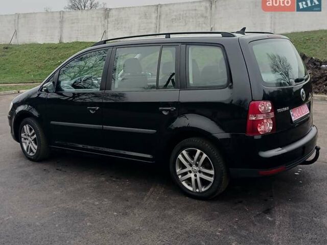 Черный Фольксваген Туран, объемом двигателя 1.6 л и пробегом 249 тыс. км за 7999 $, фото 13 на Automoto.ua