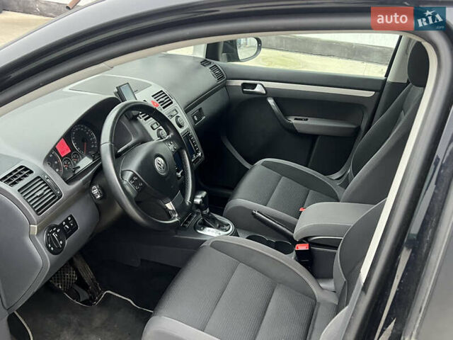 Черный Фольксваген Туран, объемом двигателя 1.4 л и пробегом 213 тыс. км за 8100 $, фото 47 на Automoto.ua