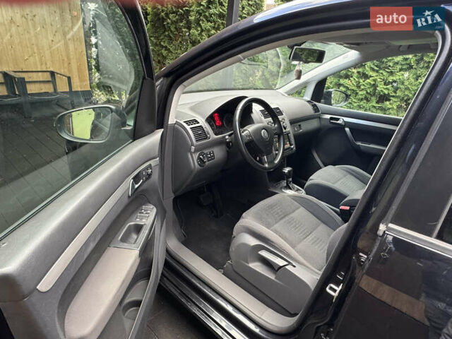 Черный Фольксваген Туран, объемом двигателя 1.4 л и пробегом 199 тыс. км за 7999 $, фото 14 на Automoto.ua