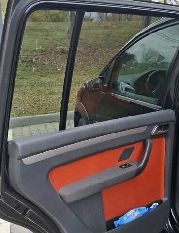 Чорний Фольксваген Туран, об'ємом двигуна 1.98 л та пробігом 245 тис. км за 10500 $, фото 11 на Automoto.ua