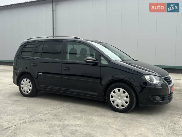 Черный Фольксваген Туран, объемом двигателя 1.4 л и пробегом 213 тыс. км за 8100 $, фото 20 на Automoto.ua