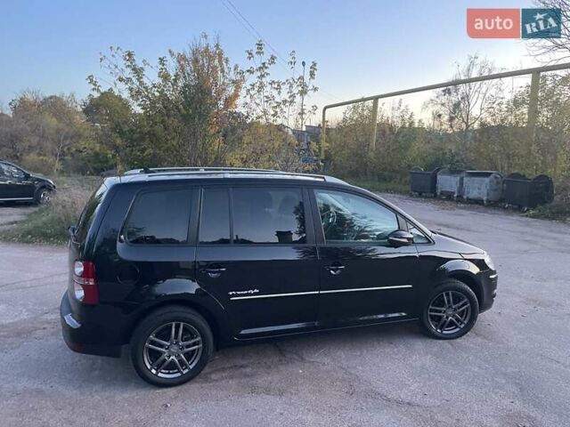 Черный Фольксваген Туран, объемом двигателя 1.4 л и пробегом 238 тыс. км за 7888 $, фото 103 на Automoto.ua