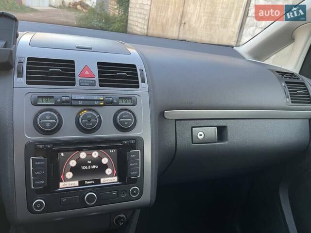 Черный Фольксваген Туран, объемом двигателя 1.4 л и пробегом 238 тыс. км за 7888 $, фото 119 на Automoto.ua