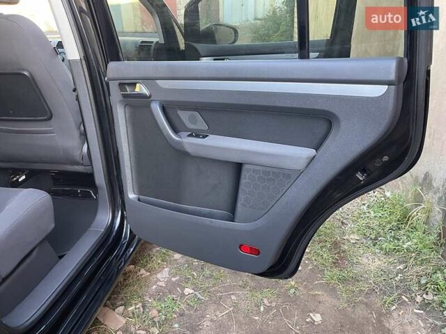 Черный Фольксваген Туран, объемом двигателя 1.4 л и пробегом 238 тыс. км за 7888 $, фото 143 на Automoto.ua