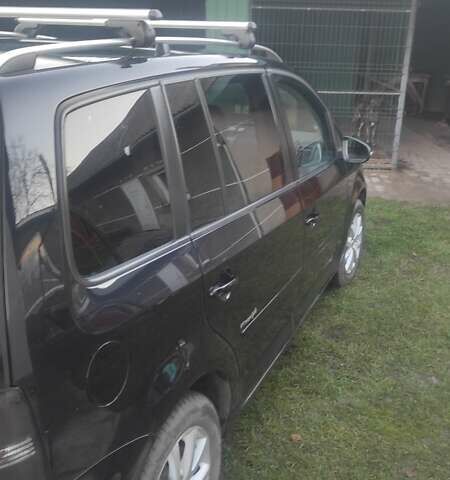 Черный Фольксваген Туран, объемом двигателя 1.39 л и пробегом 207 тыс. км за 7788 $, фото 7 на Automoto.ua