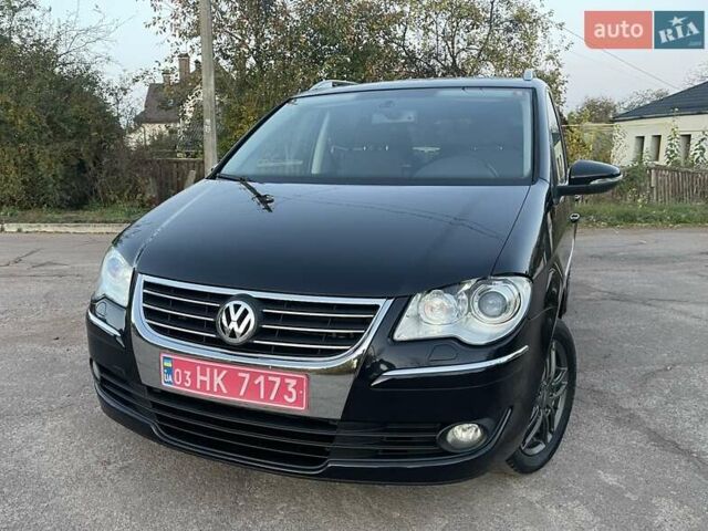 Черный Фольксваген Туран, объемом двигателя 1.4 л и пробегом 238 тыс. км за 7888 $, фото 24 на Automoto.ua