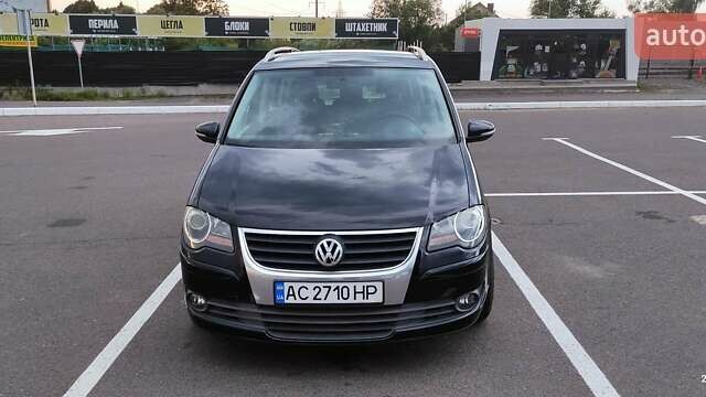Черный Фольксваген Туран, объемом двигателя 1.39 л и пробегом 195 тыс. км за 8300 $, фото 7 на Automoto.ua