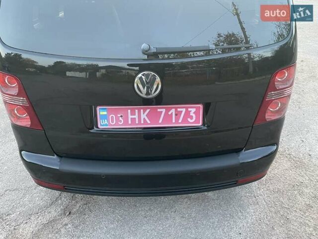 Черный Фольксваген Туран, объемом двигателя 1.4 л и пробегом 238 тыс. км за 7888 $, фото 38 на Automoto.ua