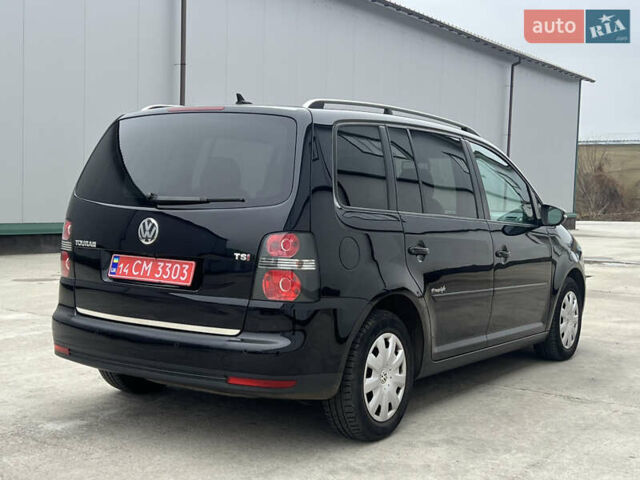 Черный Фольксваген Туран, объемом двигателя 1.4 л и пробегом 213 тыс. км за 8100 $, фото 22 на Automoto.ua