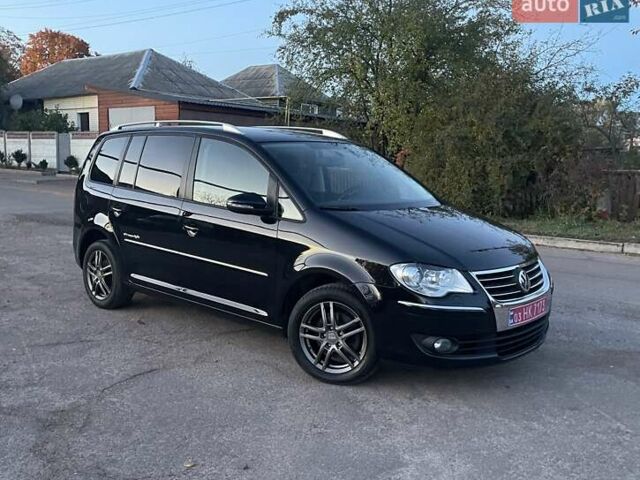 Черный Фольксваген Туран, объемом двигателя 1.4 л и пробегом 238 тыс. км за 7888 $, фото 189 на Automoto.ua