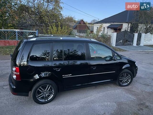 Черный Фольксваген Туран, объемом двигателя 1.4 л и пробегом 238 тыс. км за 7888 $, фото 6 на Automoto.ua