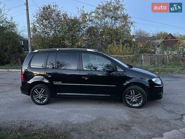 Черный Фольксваген Туран, объемом двигателя 1.4 л и пробегом 238 тыс. км за 7888 $, фото 7 на Automoto.ua