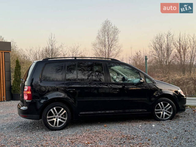 Черный Фольксваген Туран, объемом двигателя 1.6 л и пробегом 215 тыс. км за 7890 $, фото 35 на Automoto.ua