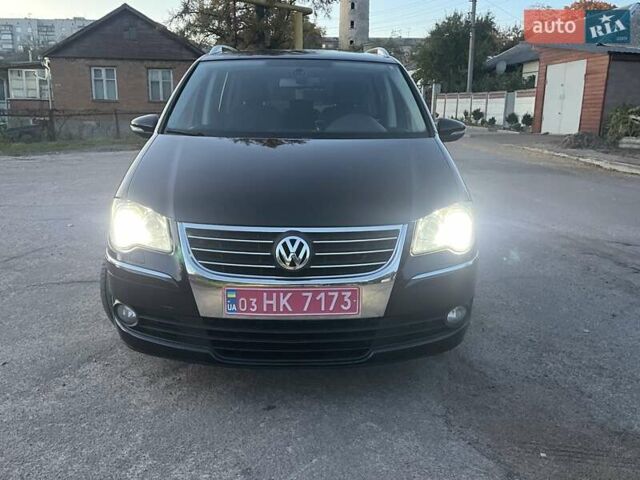 Черный Фольксваген Туран, объемом двигателя 1.4 л и пробегом 238 тыс. км за 7888 $, фото 107 на Automoto.ua