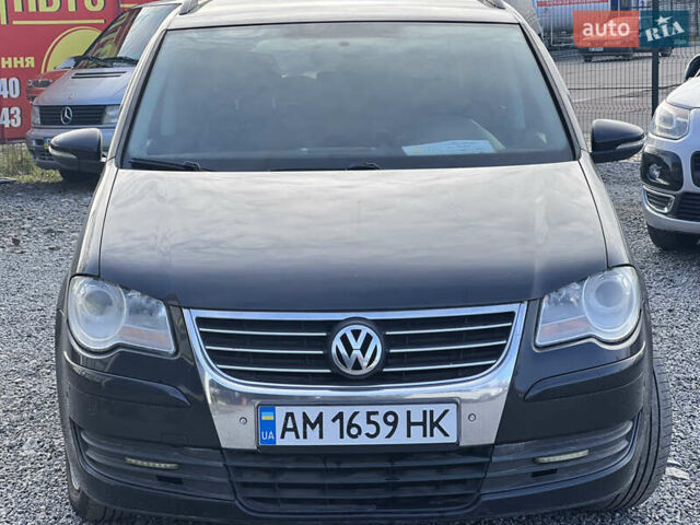 Черный Фольксваген Туран, объемом двигателя 1.4 л и пробегом 290 тыс. км за 6900 $, фото 4 на Automoto.ua