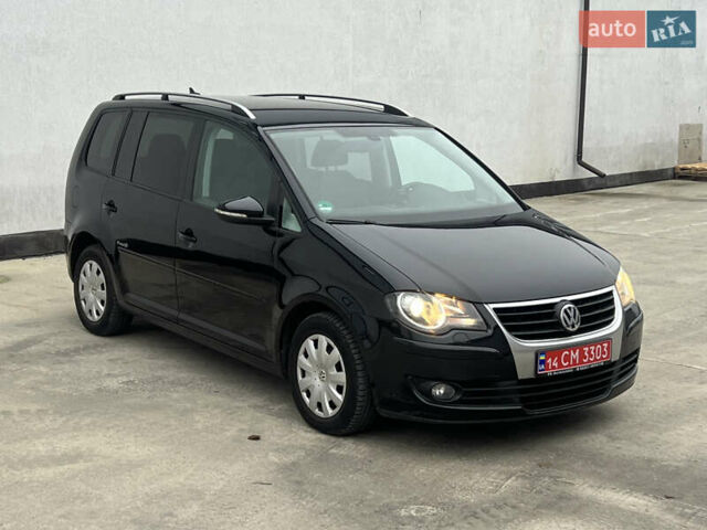 Черный Фольксваген Туран, объемом двигателя 1.4 л и пробегом 213 тыс. км за 8100 $, фото 85 на Automoto.ua