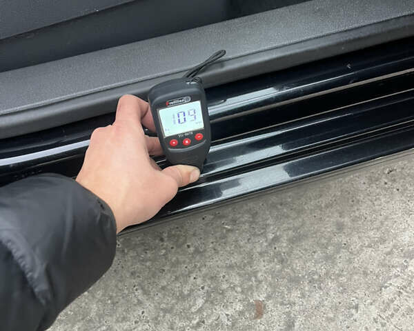 Черный Фольксваген Туран, объемом двигателя 1.4 л и пробегом 213 тыс. км за 8100 $, фото 74 на Automoto.ua