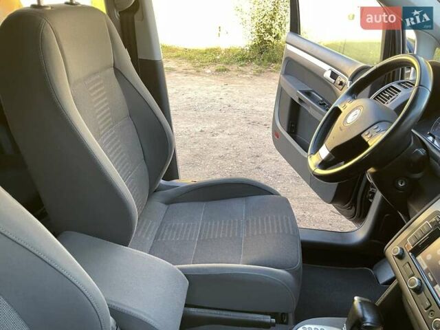 Черный Фольксваген Туран, объемом двигателя 1.4 л и пробегом 238 тыс. км за 7888 $, фото 235 на Automoto.ua