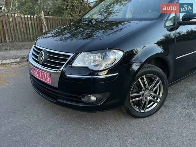 Черный Фольксваген Туран, объемом двигателя 1.4 л и пробегом 238 тыс. км за 7888 $, фото 208 на Automoto.ua