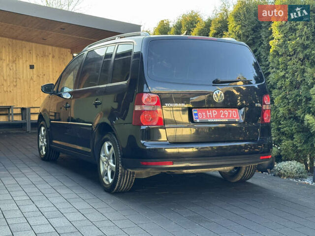Черный Фольксваген Туран, объемом двигателя 1.4 л и пробегом 199 тыс. км за 7999 $, фото 8 на Automoto.ua
